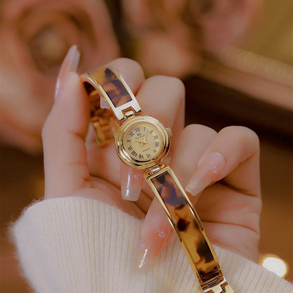 Women Quartz Watch Elegant Gold Case Resin Tortoiseshell Strap Roman Numerals Round Dial Retro